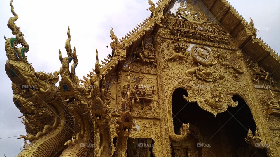 Ornate dragon decorations in Thai Buddhist Temple