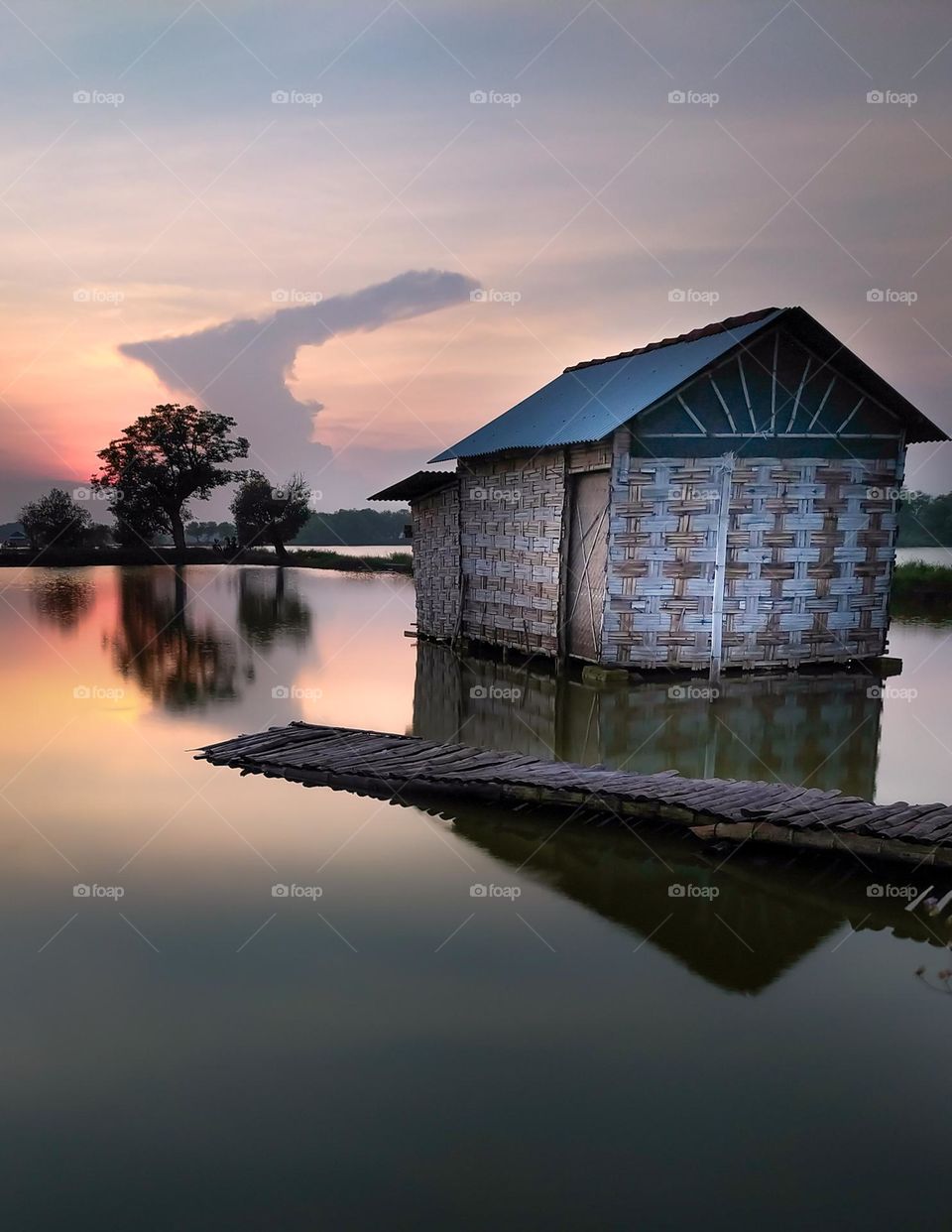 Floating house in a fish pond
