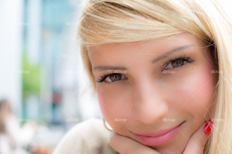 smiling girl with beautiful face and eyes and blonde hair