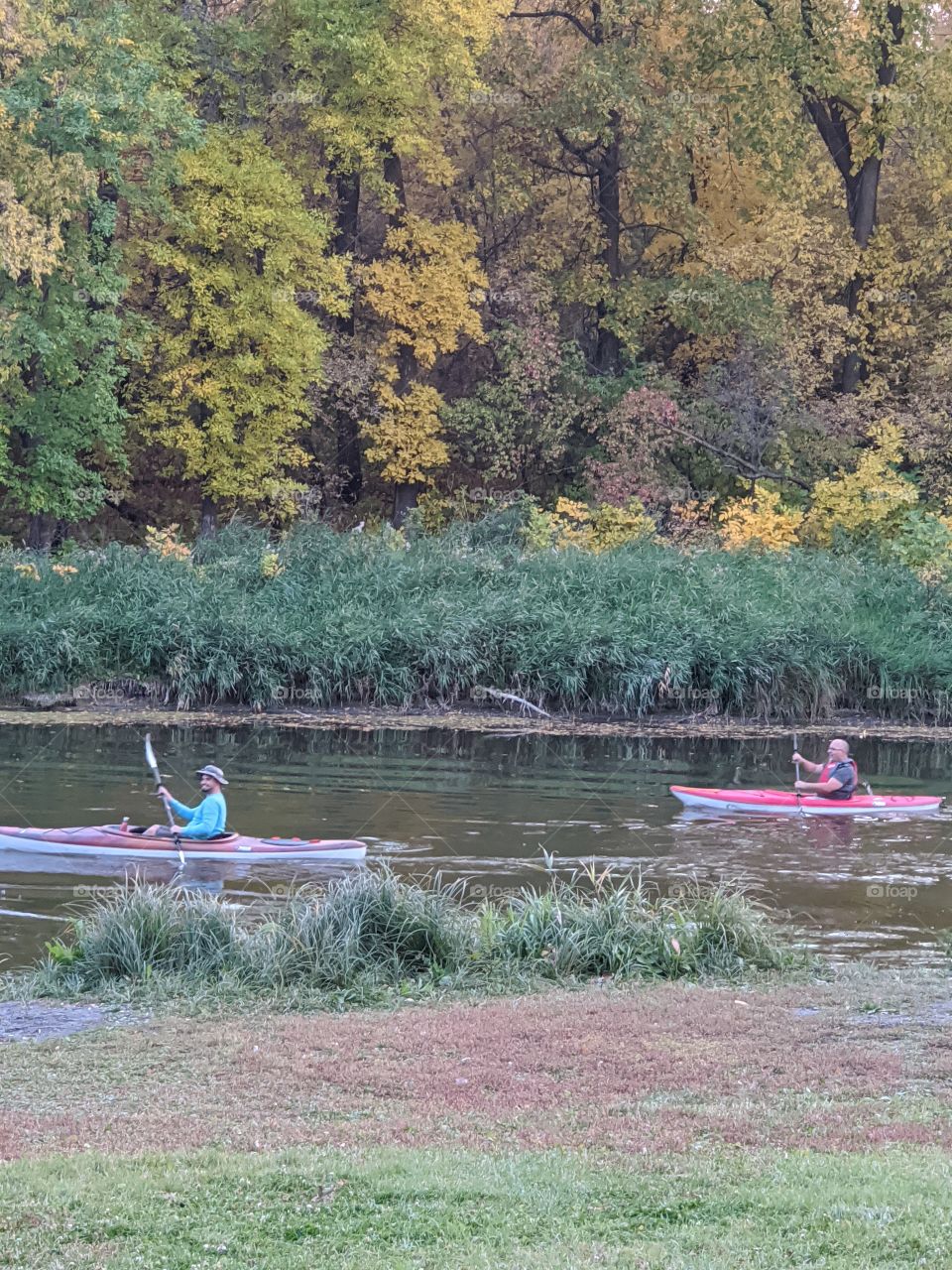 Kayaking on the river on a lovely autumn evening