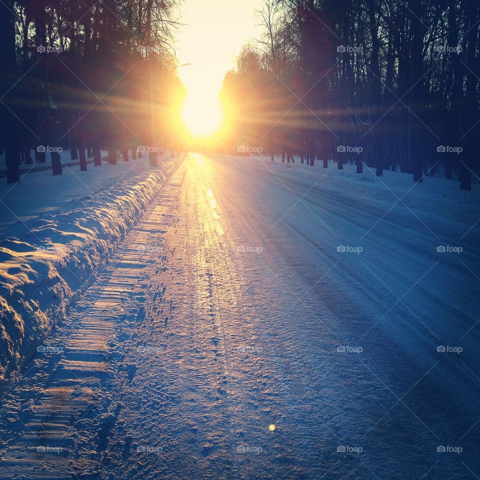 Winter road. winter road and sunset