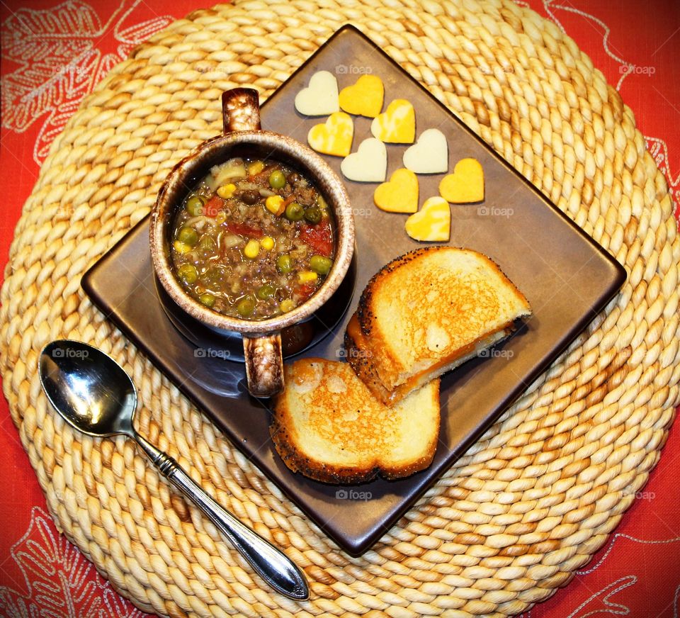 High angle view of vegetable soup and cheese sandwich