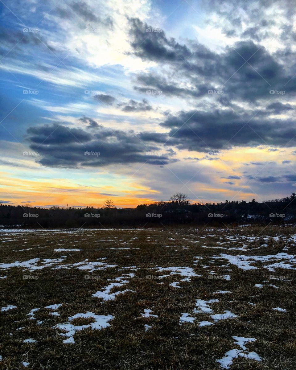 Sunset in a field of snow