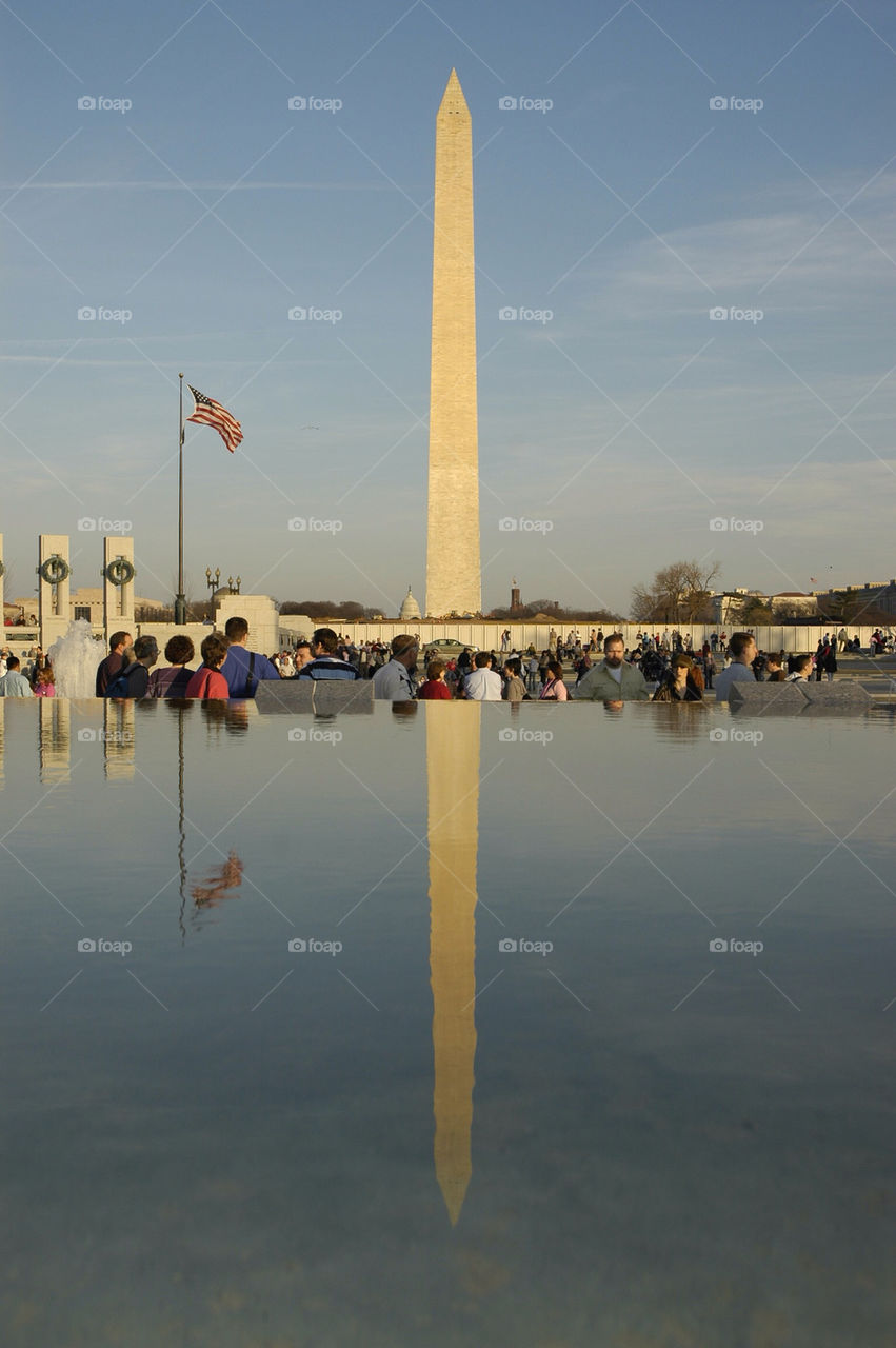 The Washington Monument reflected in a pool at the World War II