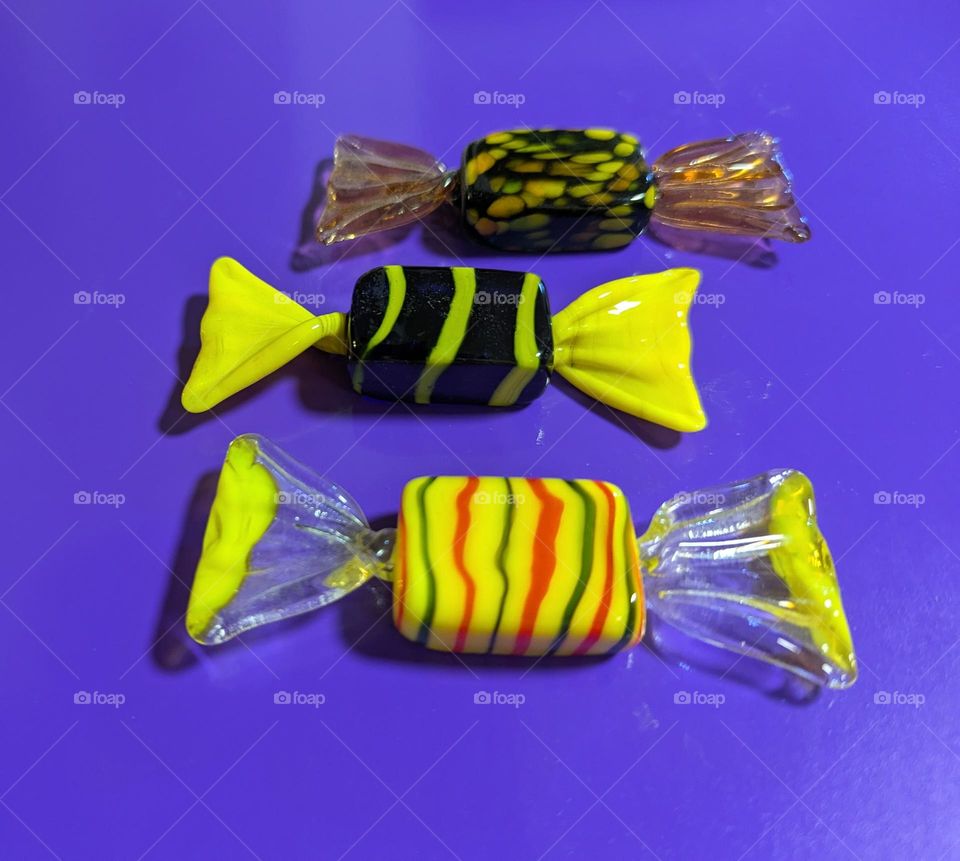 yellow candy on a purple background