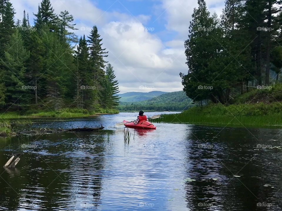 A beautiful day kayaking on Lac Monroe in Mont Tremblant National Park, Quebec, Canada.