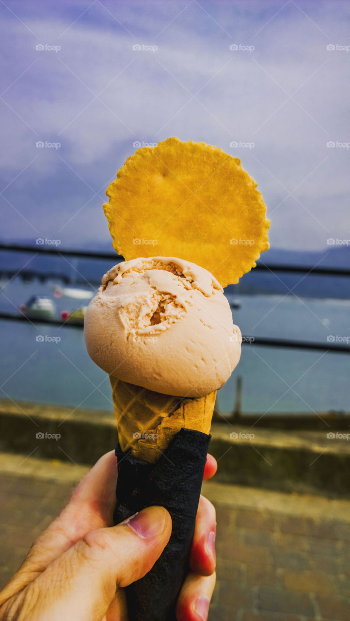 Ice cream . Holding cornet 