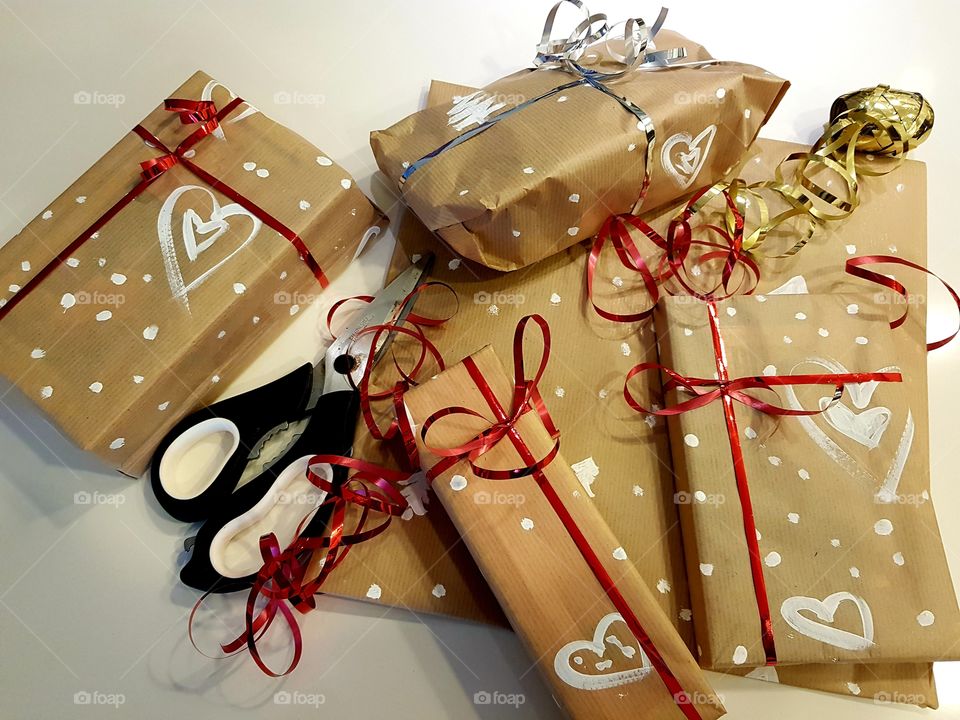 wrapping Xmas presents with hand painted brown paper