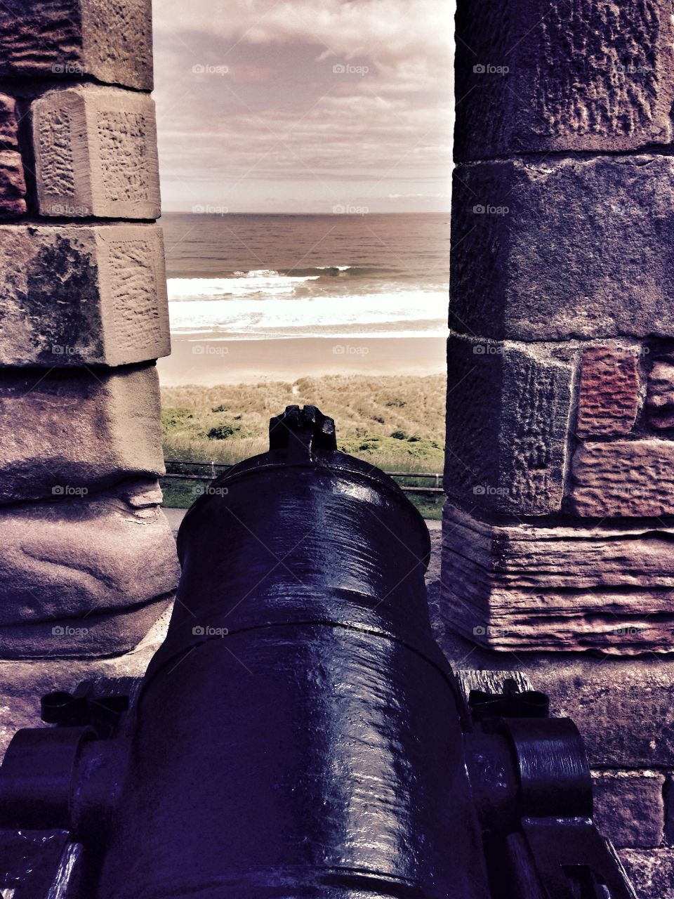 Cannon. Castle turret, looking out to sea