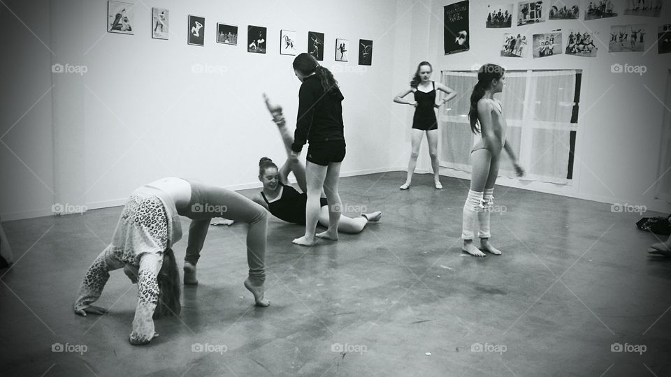Trainer with group of young dancers