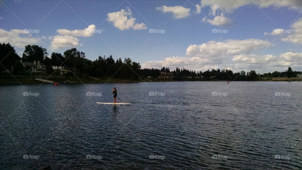 Paddle boarding. Taken from elk island on Willamette river.