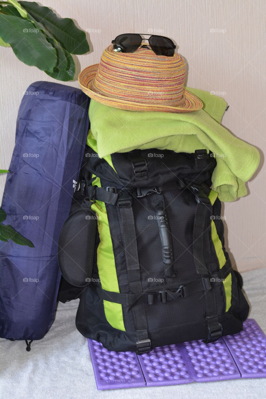 summer travel backpack and objects