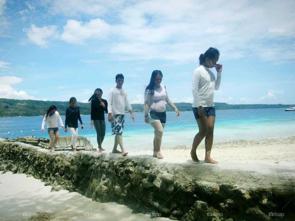 This is isla rita samal island located in Mindanao Philippines. It is very clean with crystal water. 