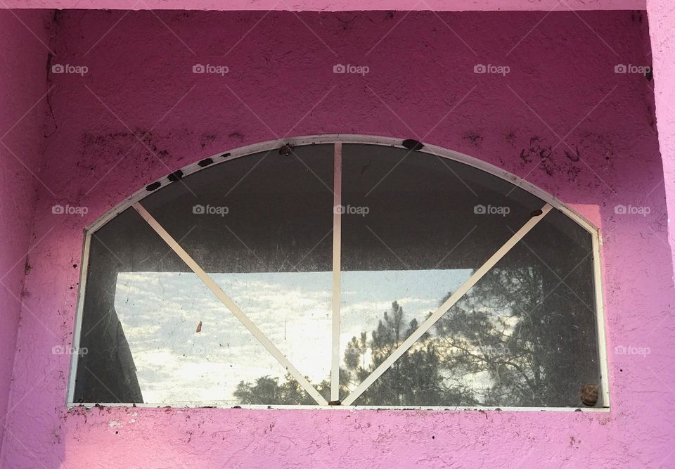 Old window with triangles.