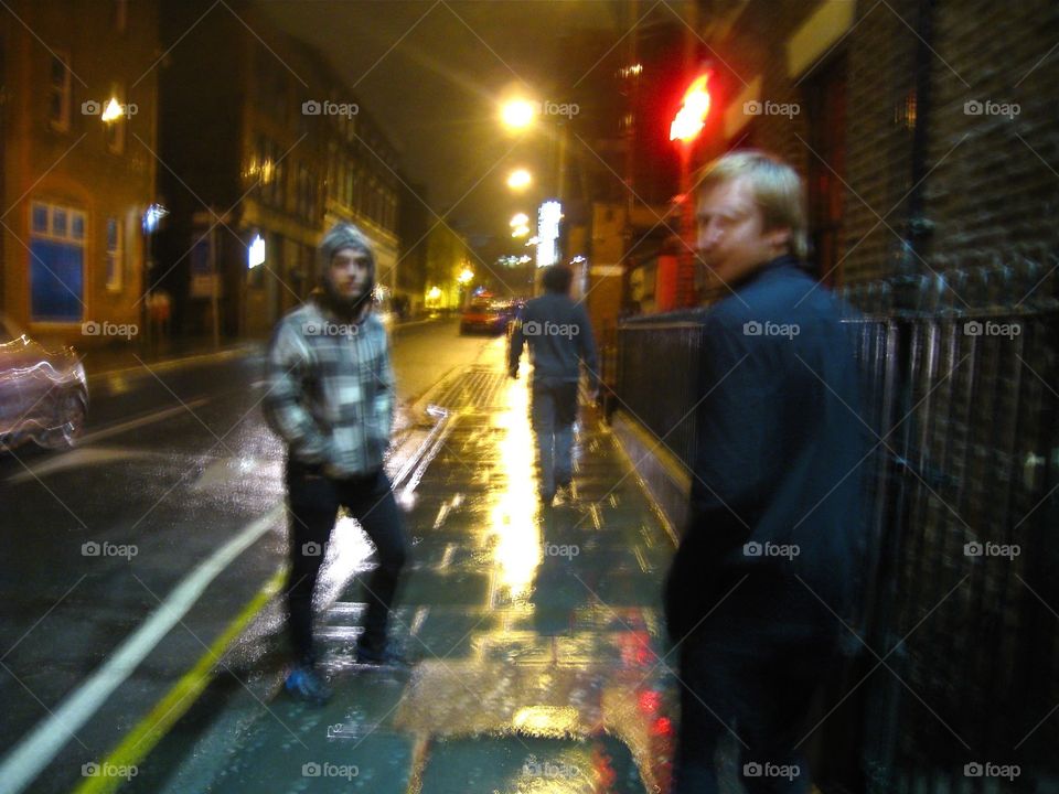 Boyband. Some of my friends and I were walking home from a concert in Liverpool, England. They look like a boyband. 