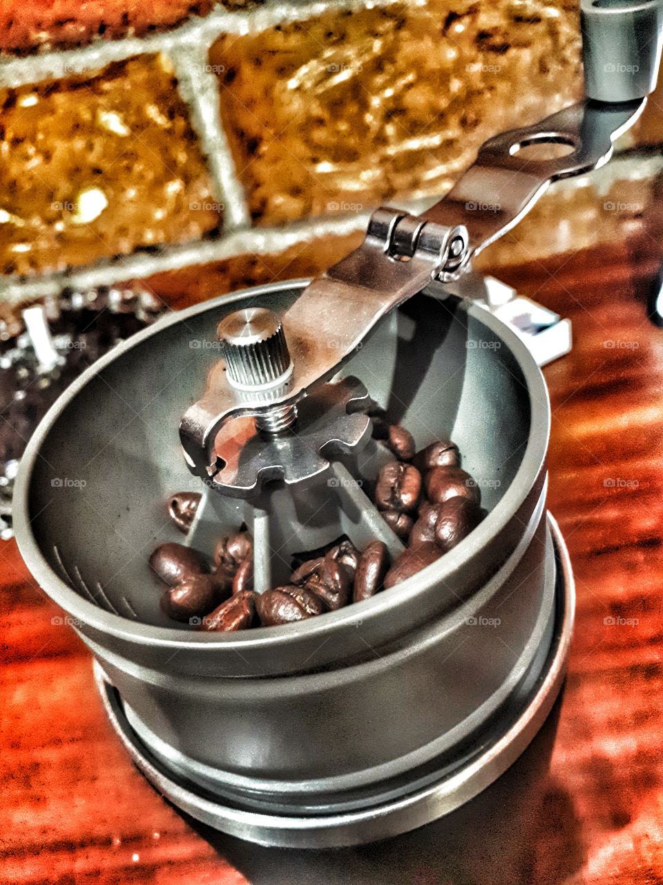 grinding coffee beans with cafflano