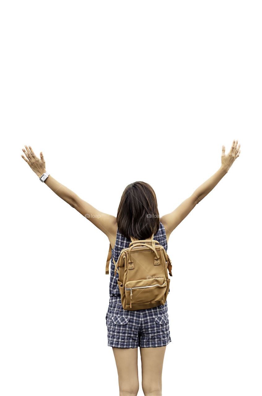 Women raise their arms and shoulder backpack on a white background with clipping path.