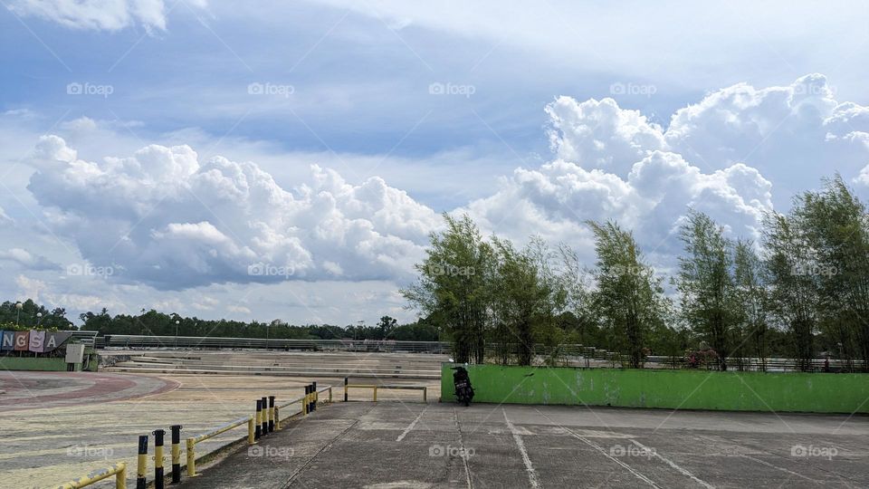 white clouds above sungai siak