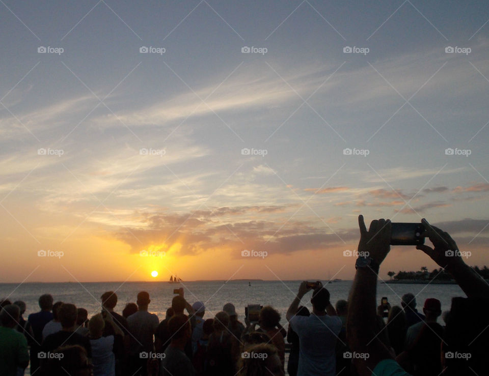 Taking photo of sunset. Florida Boardwalk 