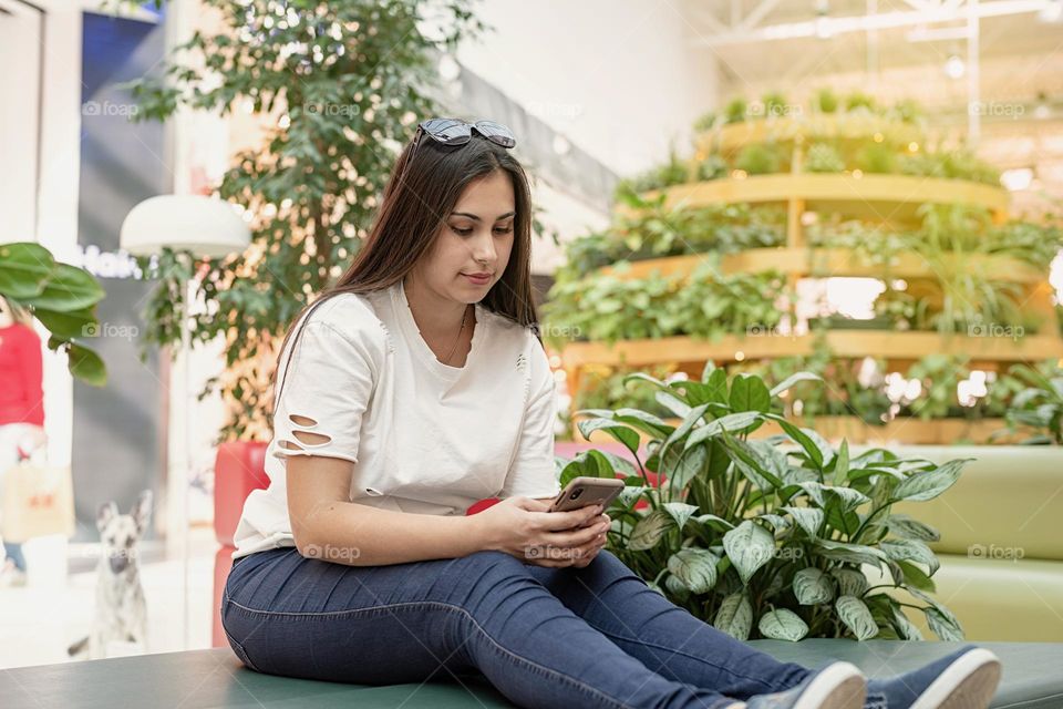 woman using smartphone