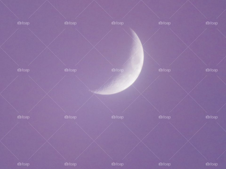 Moon in purple sky