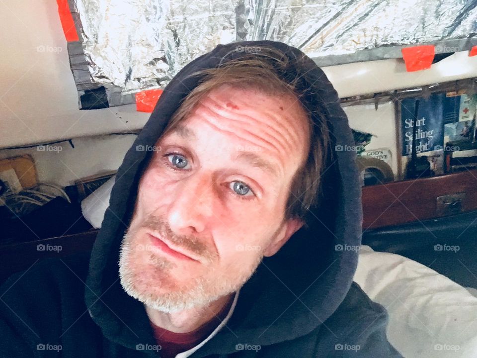 Timothy Trespas aboard our sailboat, the „Salvation“ at Newtown Creek in Long Island City, Queens, New York photographed in the Fall of 2018. Hypnotic Productions