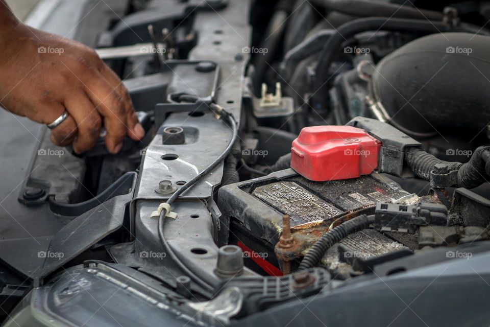 Checking the fluids in the car