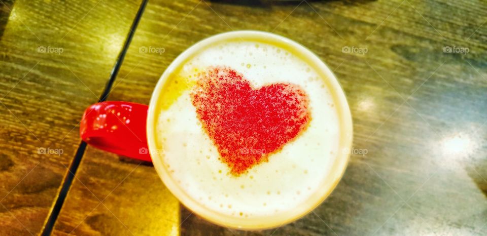 coffee with red color heart shape