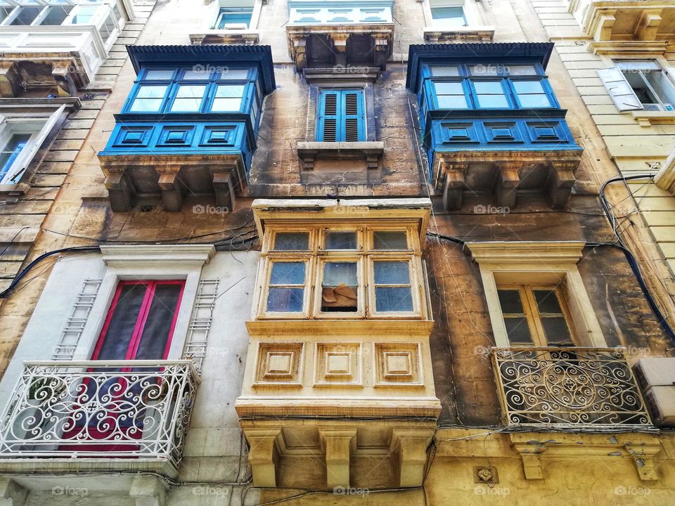 typical wooden balconies of the old town of Valletta (Malta)