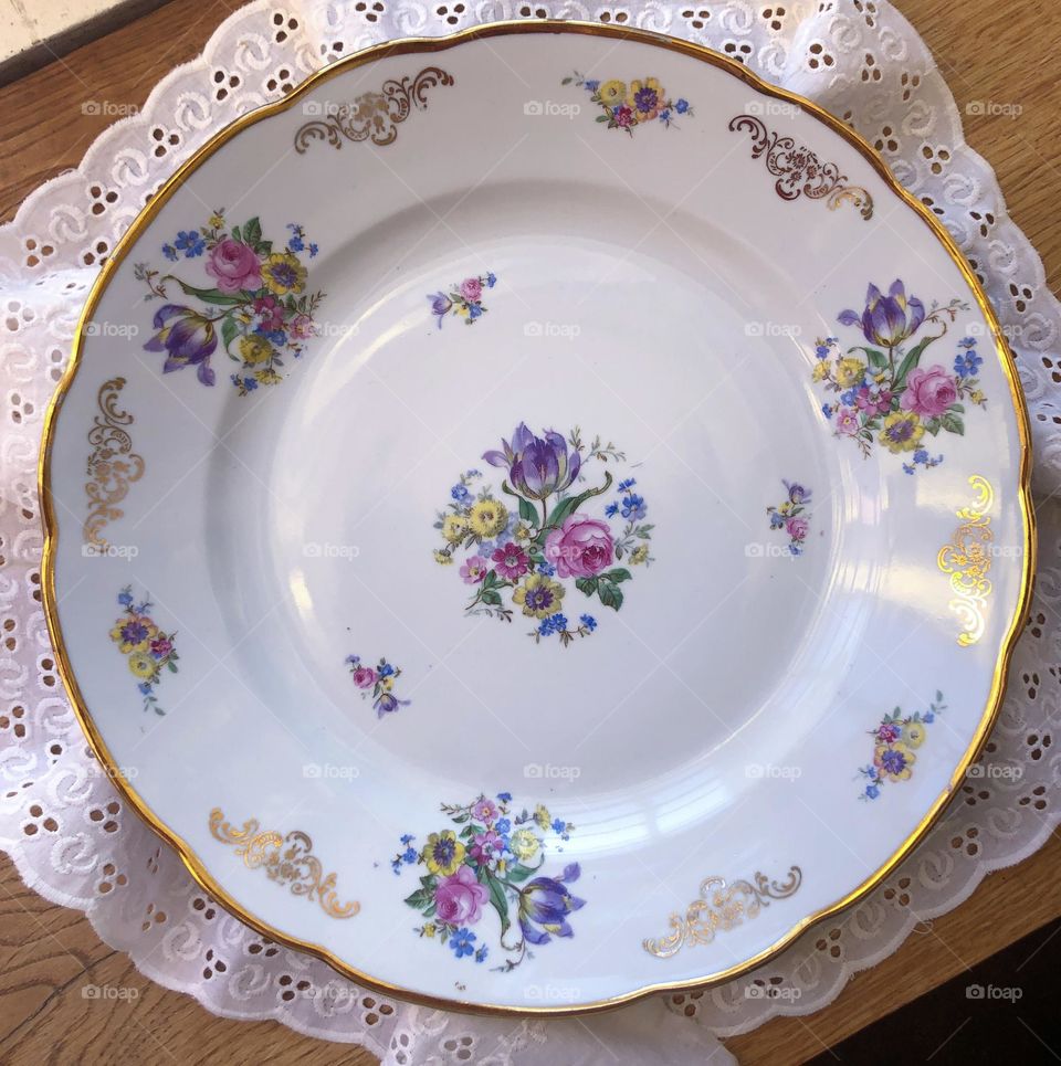 Vintage porcelain dish with Meissen bouquets pattern and golden ornament