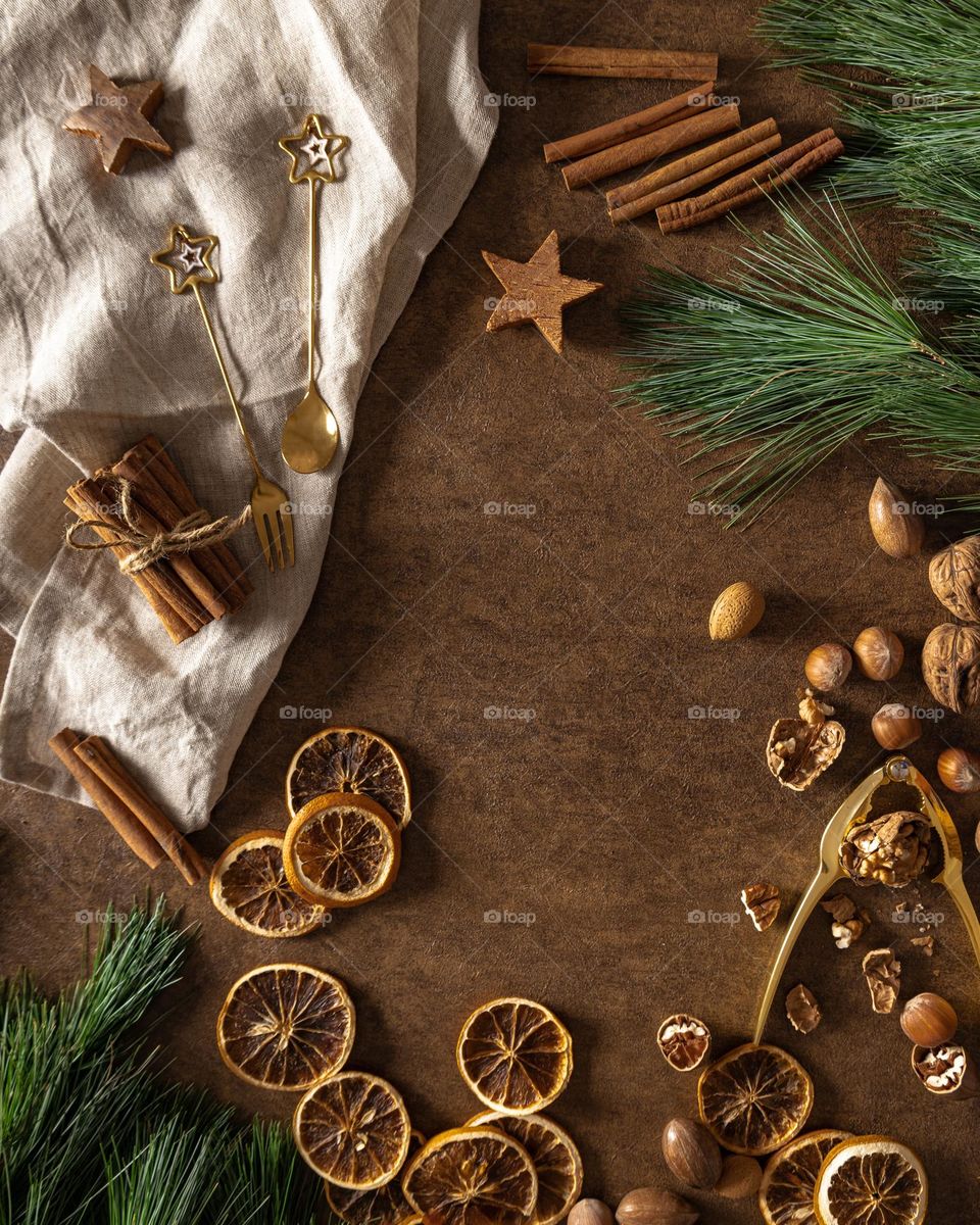 Winter flatlay, nuts , cinnamon 