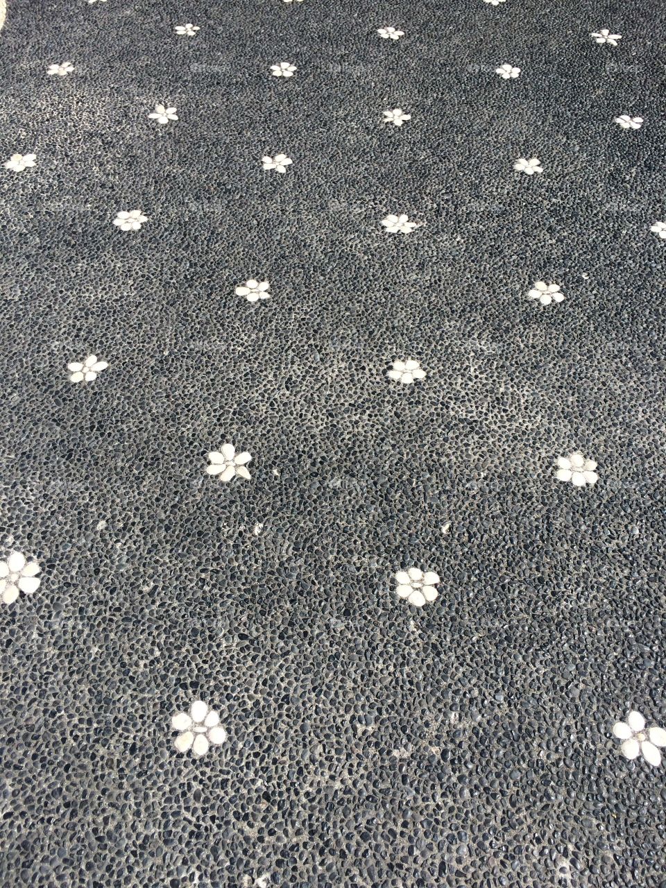 Flower Pavement, Angled View. Bali, Indonesia. June 2017.