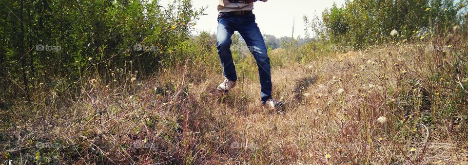 jumping boy on the ground