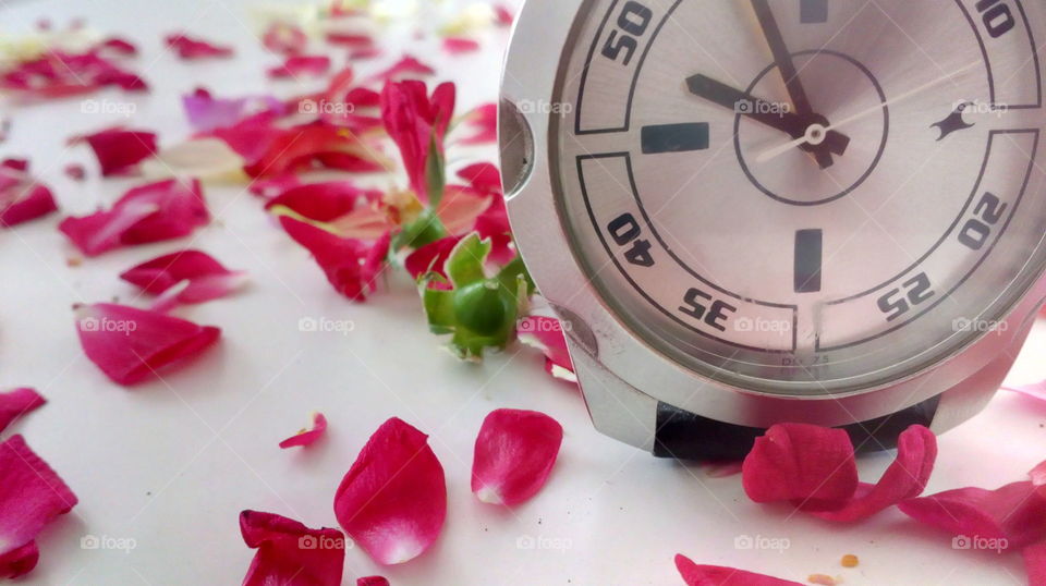 watch and flowers
