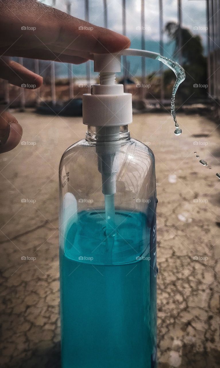 A Santizer Splash coming out of its bottle.