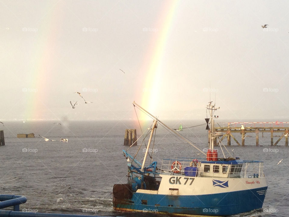 sky rainbow scotland seagulls by dougpix
