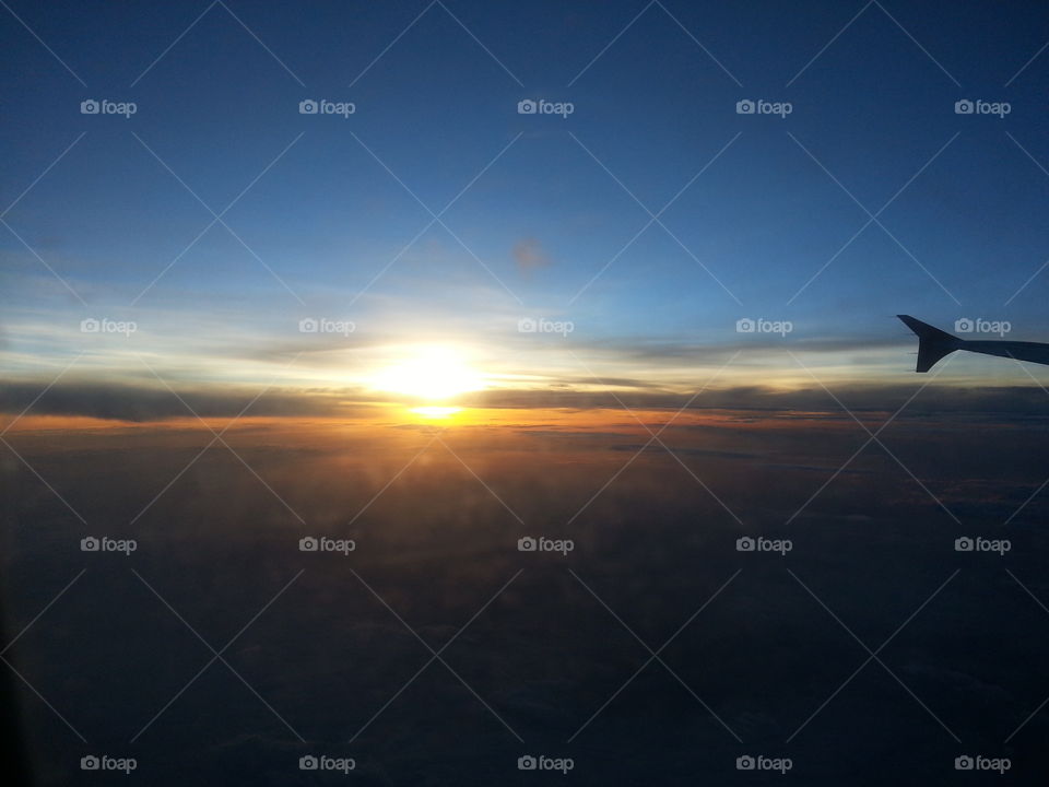 aeroplane sunrise clouds