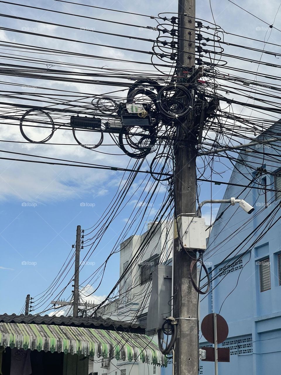 View of the electrical line with blue sky background 