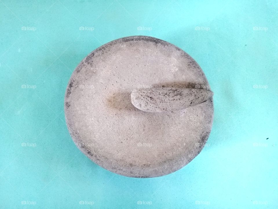 Traditional javanese cooking spice maker made of natural stone