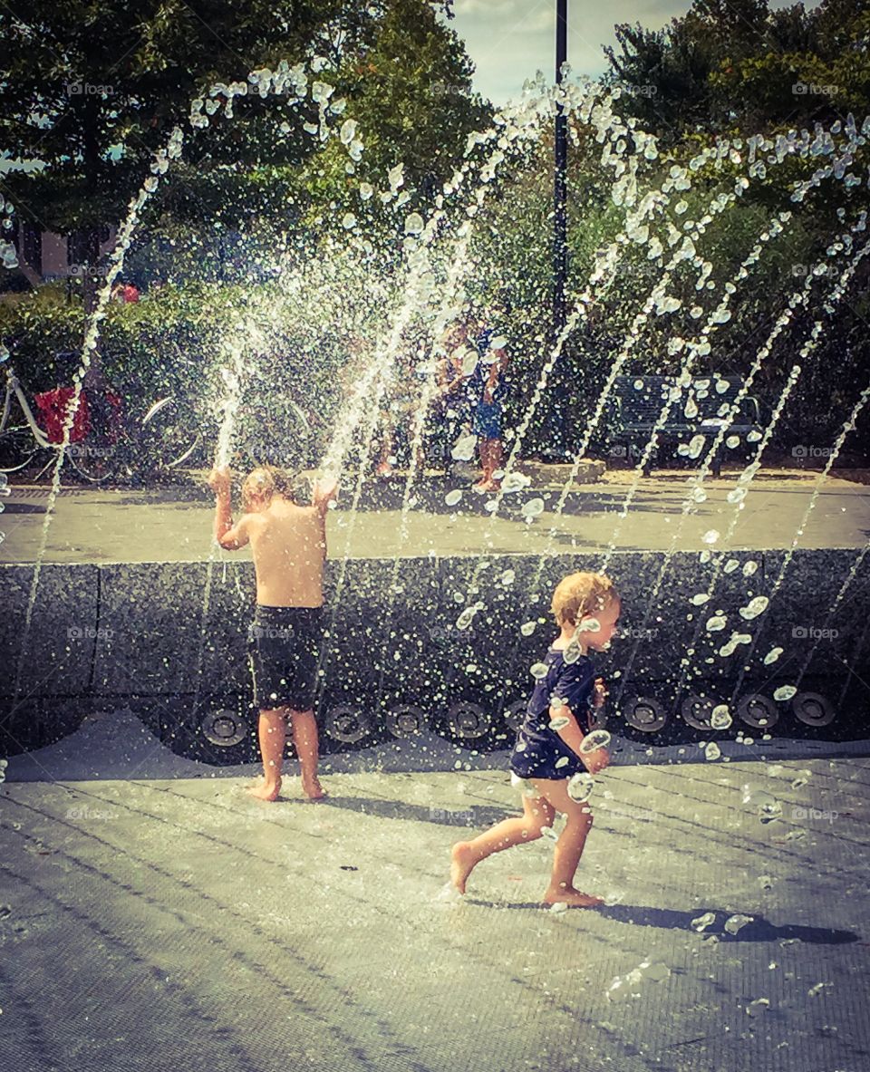 Boys playing in water
