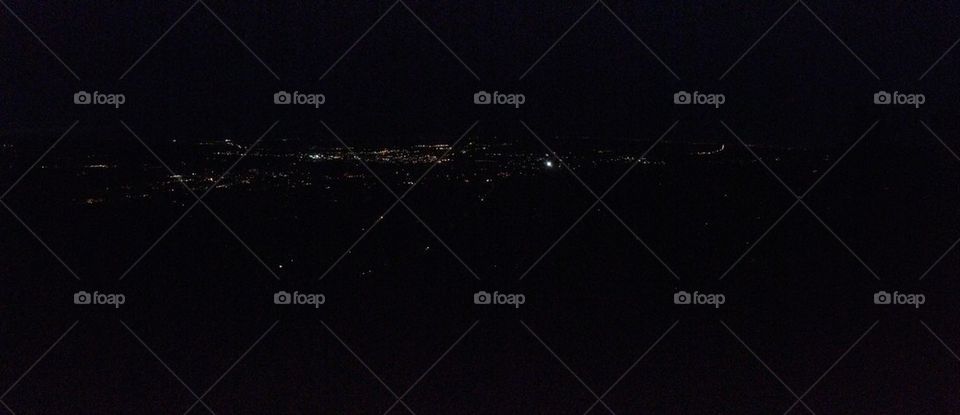 Mountaintop view of Boulder at night