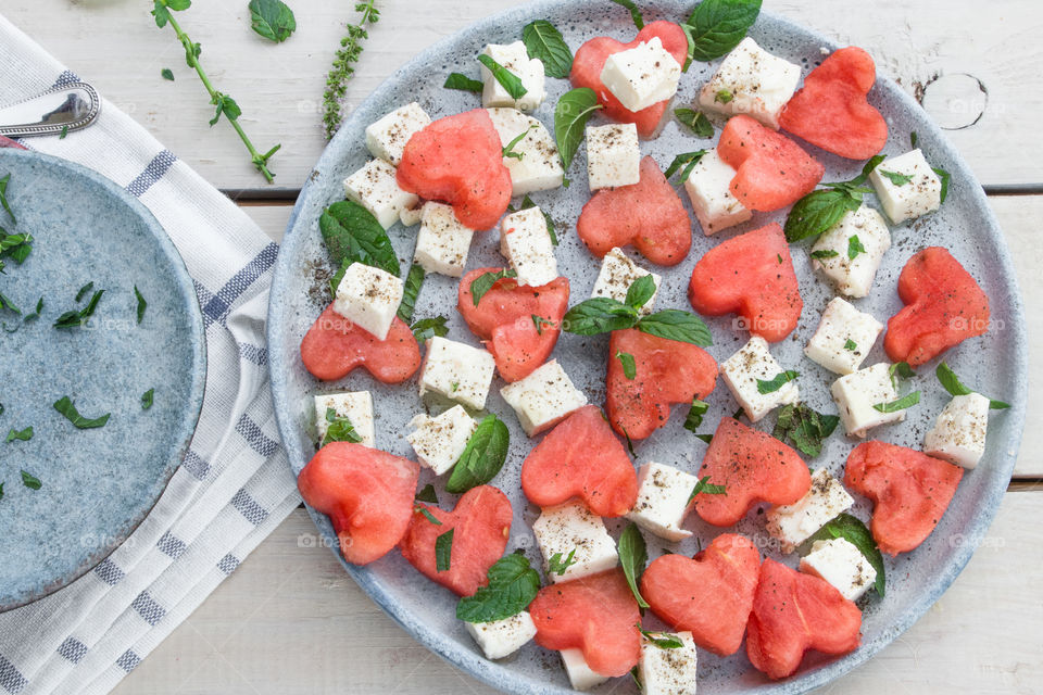 Heart shape of watermelon and feta cheese salad