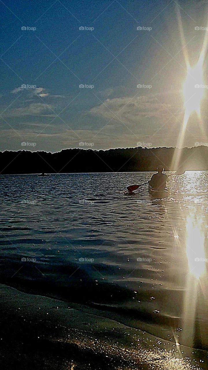 kayaking at dusk