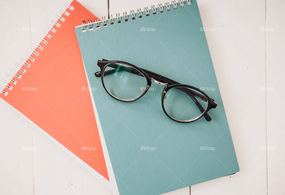 Notebooks and glasses