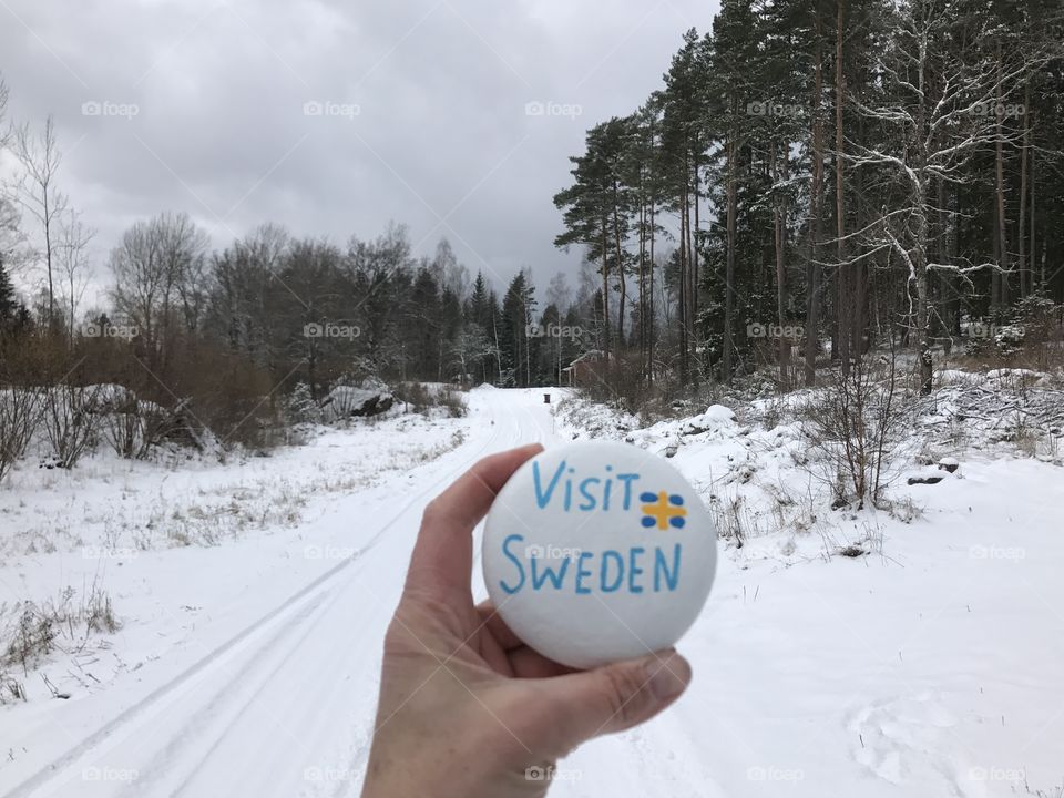 Flag of Sweden and text written on white ball