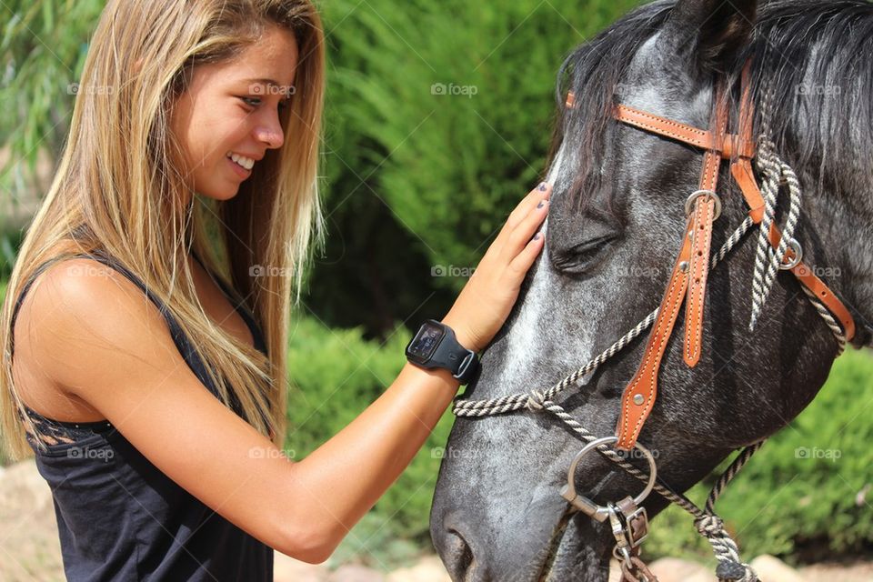Girl loves horse