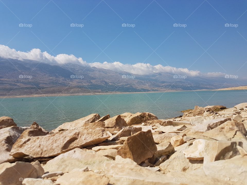 mix of mountain, lake and rock