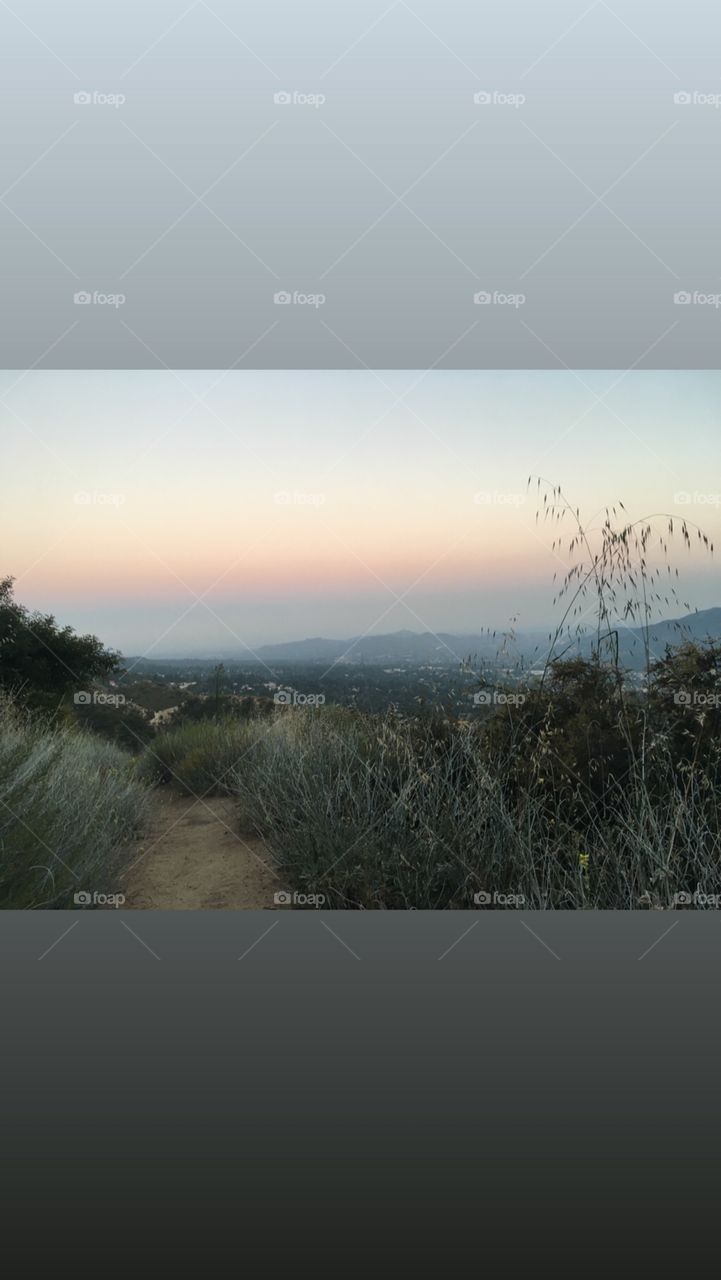 Post sunset scenery overlooking mountain scapes of SoCal from Deukmejian Wilderness Park hiking trail