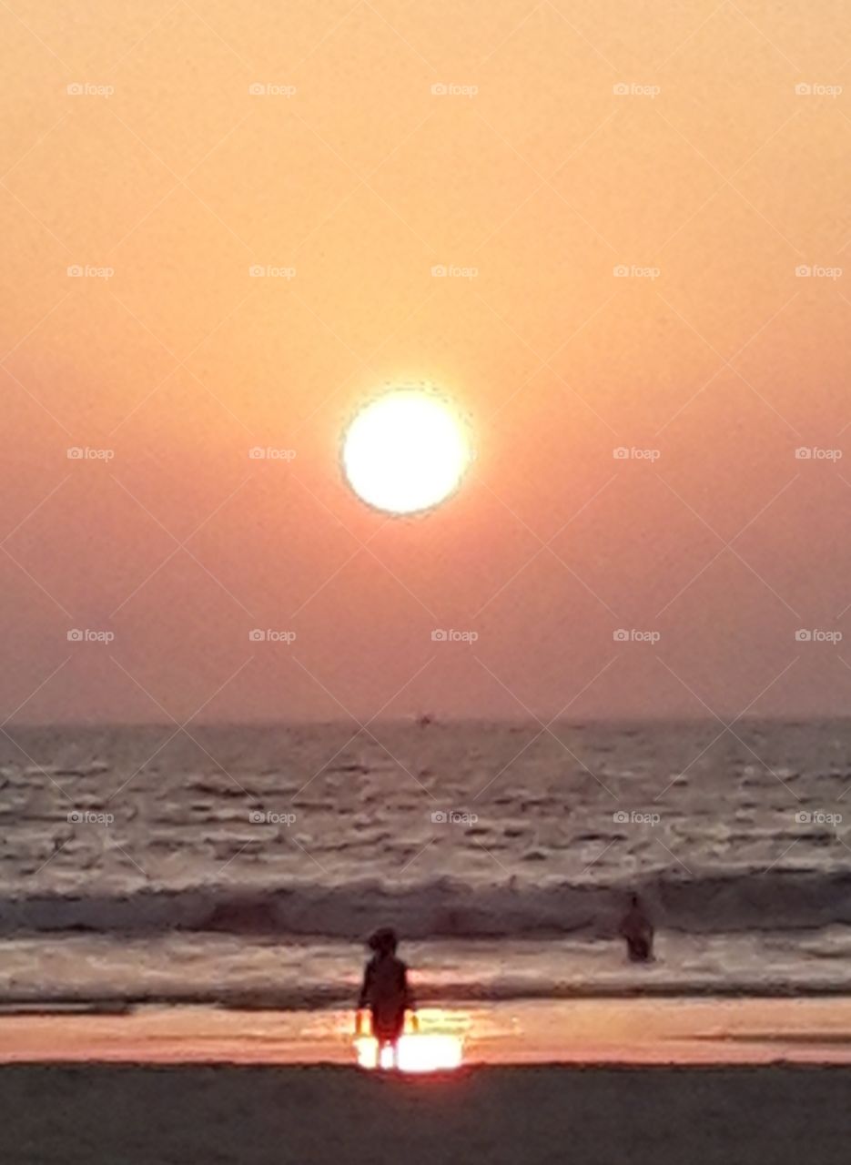 sunset on the beach at Leela Goa