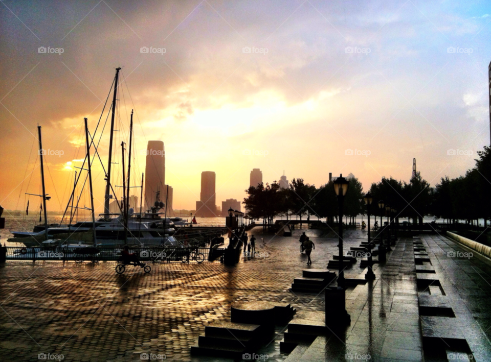 city sunset rain boat by darrellalonzi